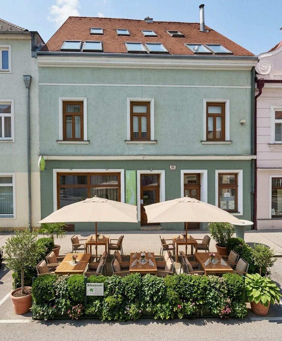 Hausansicht mit Gestaltungsvorschlag für Schanigarten